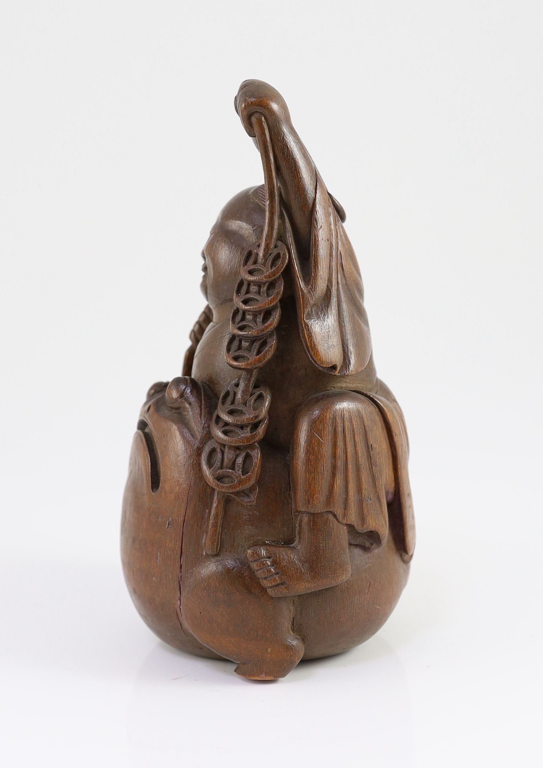 A Chinese bamboo group of Liu Hai and his three legged toad, 19th century, 22cm high, splits and and staining